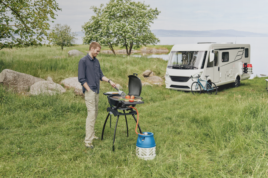 Man grilling at campsite
