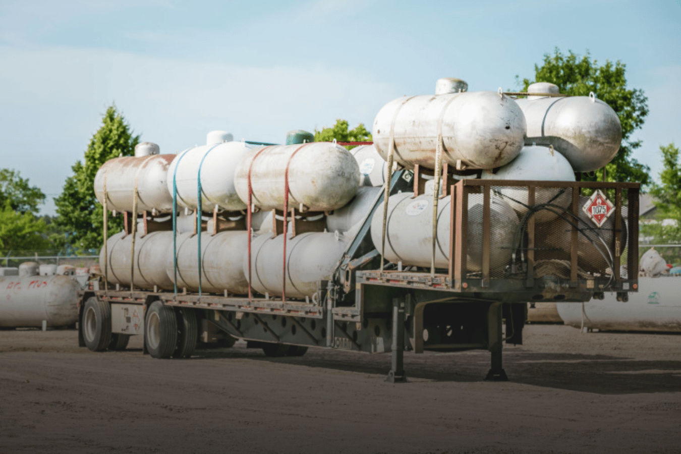 Truckload of old, large propane tanks